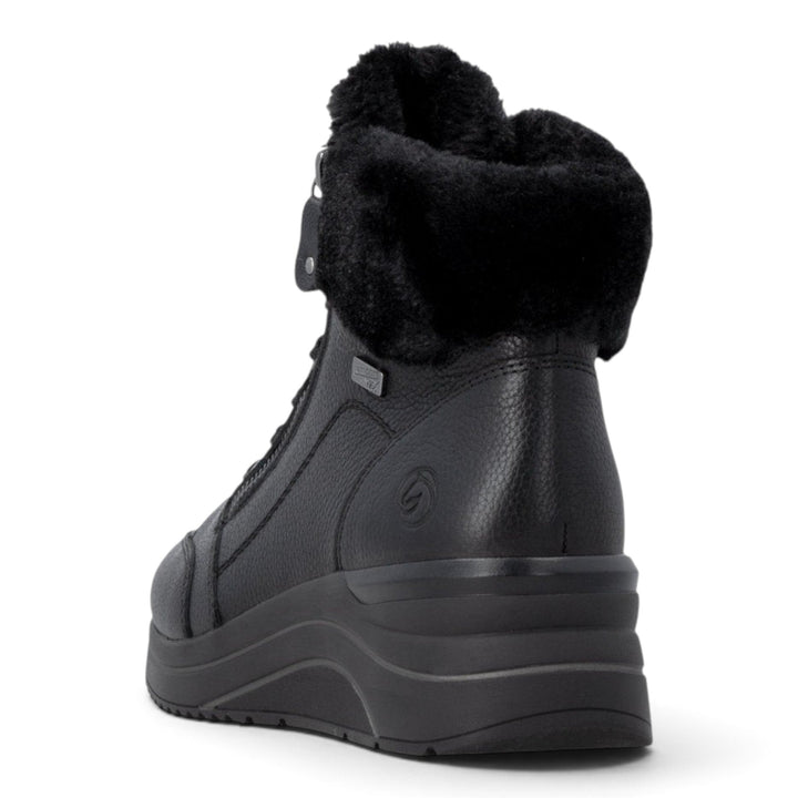 ada-shoes.ro Remonte black leather winter boots with wool lining, side zippers, and Remonte TEX waterproof membrane.