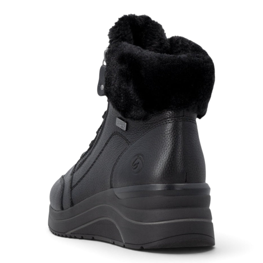 ada-shoes.ro Remonte black leather winter boots with wool lining, side zippers, and Remonte TEX waterproof membrane.