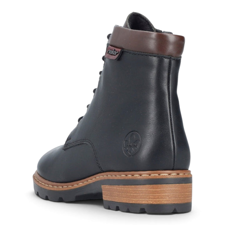 ada-shoes.ro Rieker black faux leather ankle boots with brown trim, side zipper, and robust lug sole, rear view.