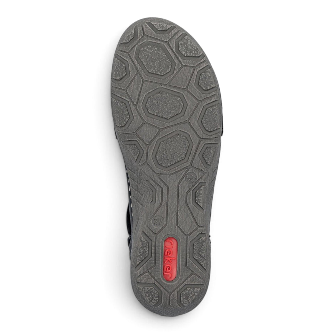 ada-shoes.ro Rieker black ankle boot sole with a textured hexagonal pattern for grip and a red logo insert