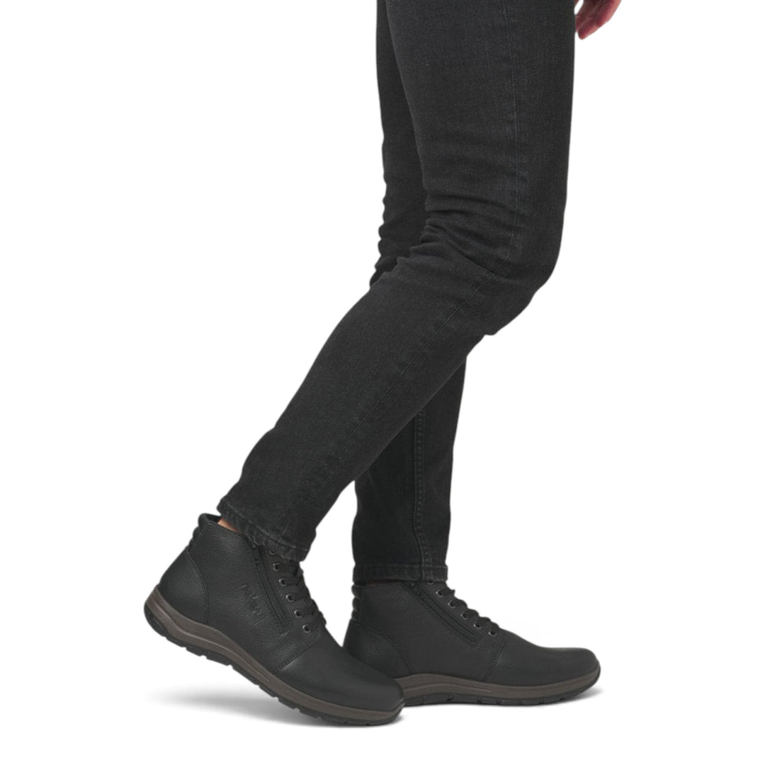 ada-shoes.ro Rieker black leather ankle boots with side zippers and laces worn with black jeans