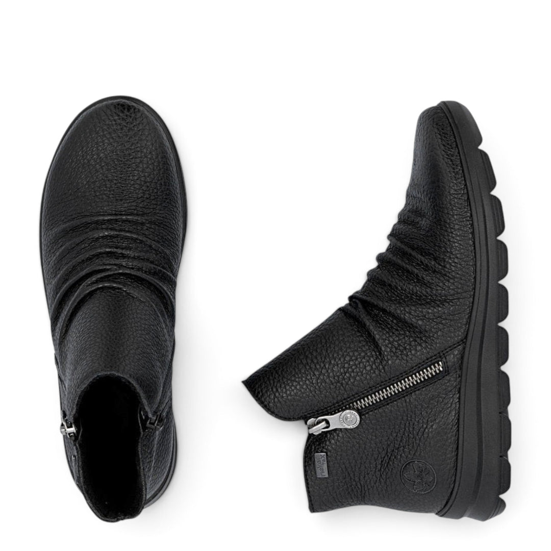 ada-shoes.ro Rieker black leather ankle boots with side zipper, warm lining, and flexible Antistress sole.