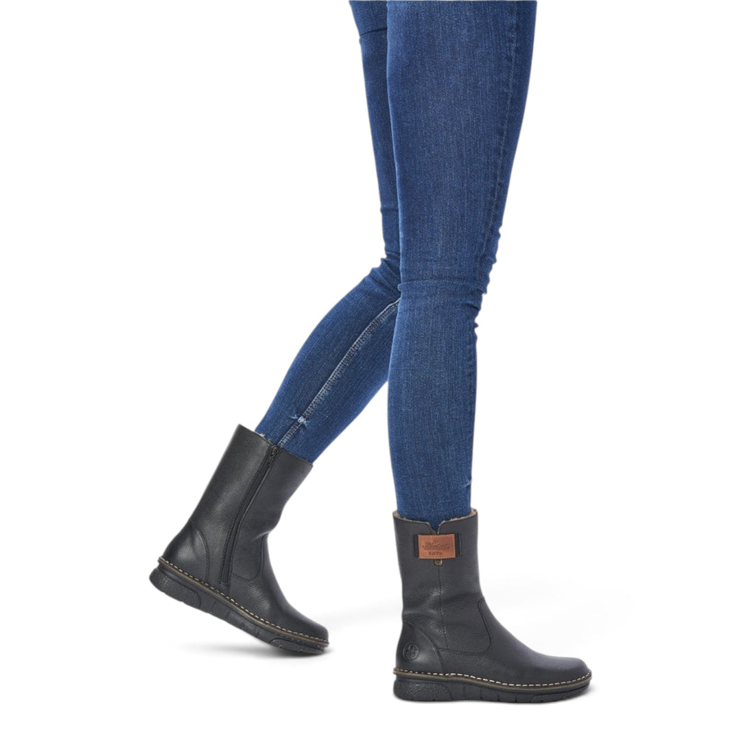 ada-shoes.ro Rieker black leather boots with wool lining and side zipper worn with blue jeans