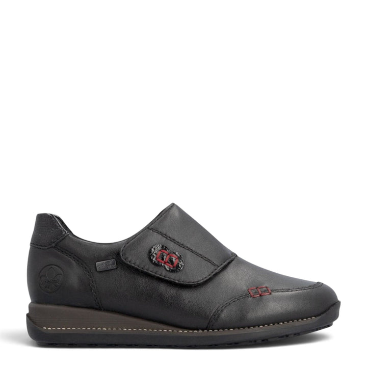 ada-shoes.ro Rieker black leather casual slip-on shoe with velcro strap and red stitching detail