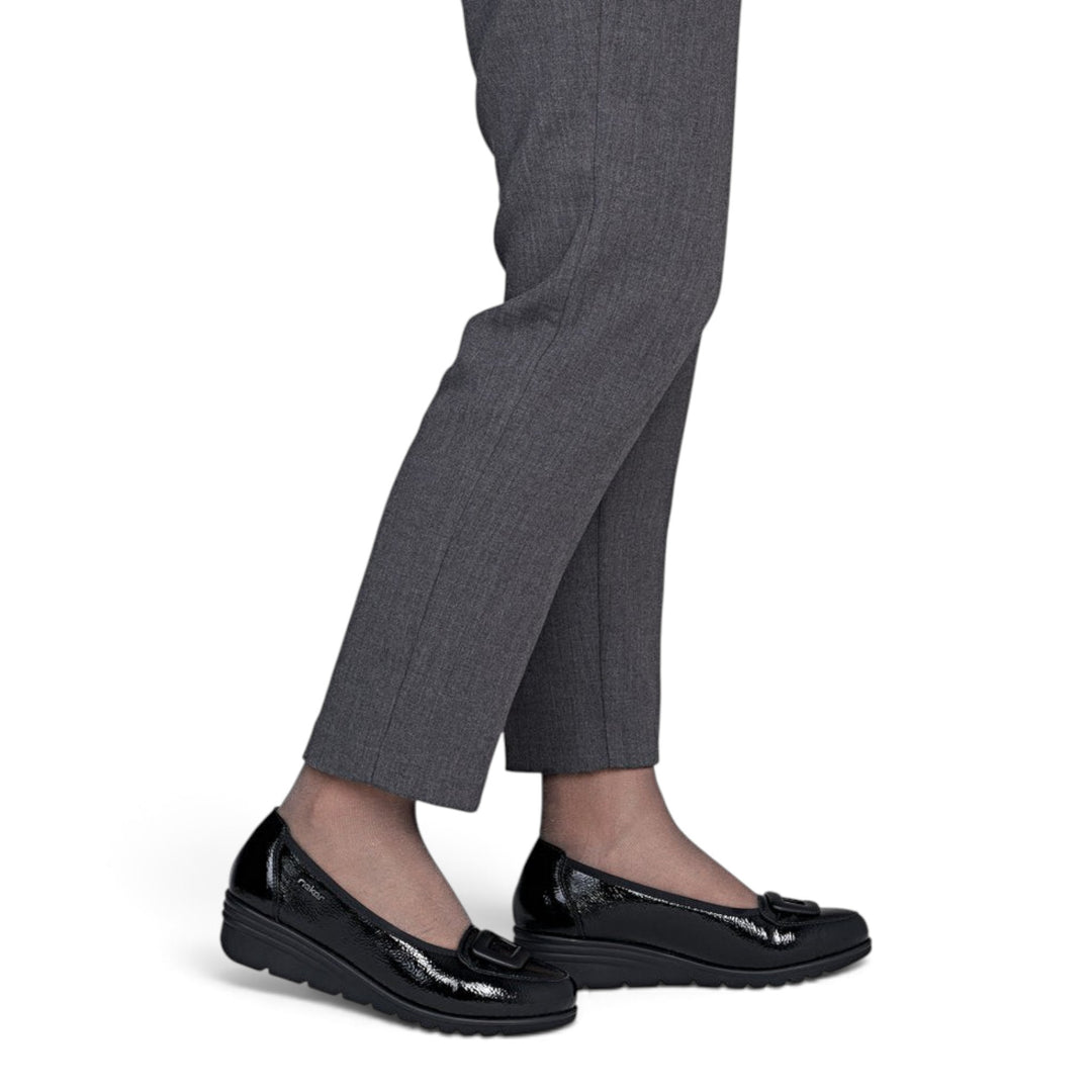 ada-shoes.ro Rieker Antistress black patent casual shoes with a wedge sole worn with grey trousers