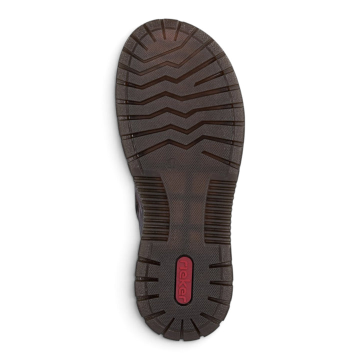Brown Rieker casual boot sole with anti-slip tread pattern and red logo detail from ada-shoes.ro