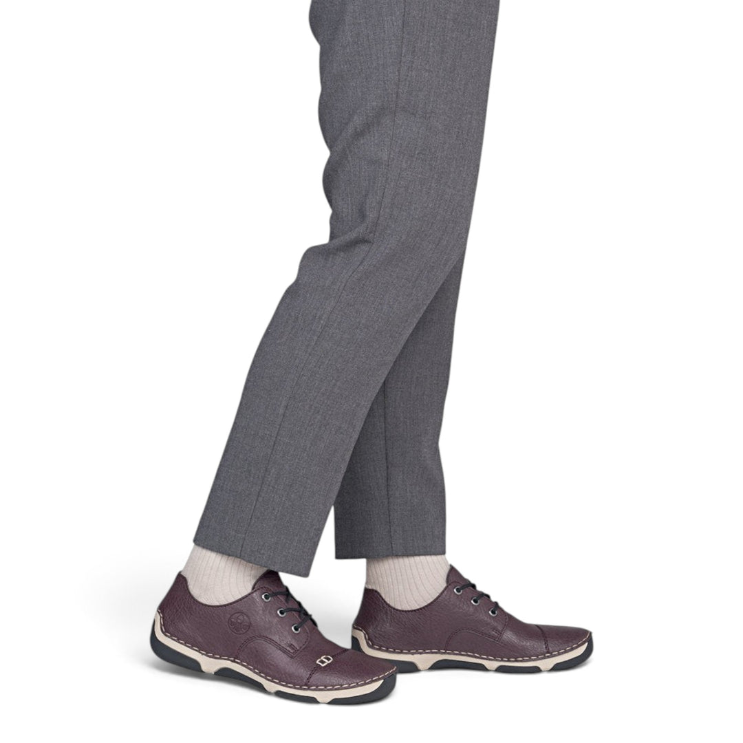 ada-shoes.ro Rieker Antistress burgundy casual sneakers with lace-up closure and flexible sole worn with grey trousers