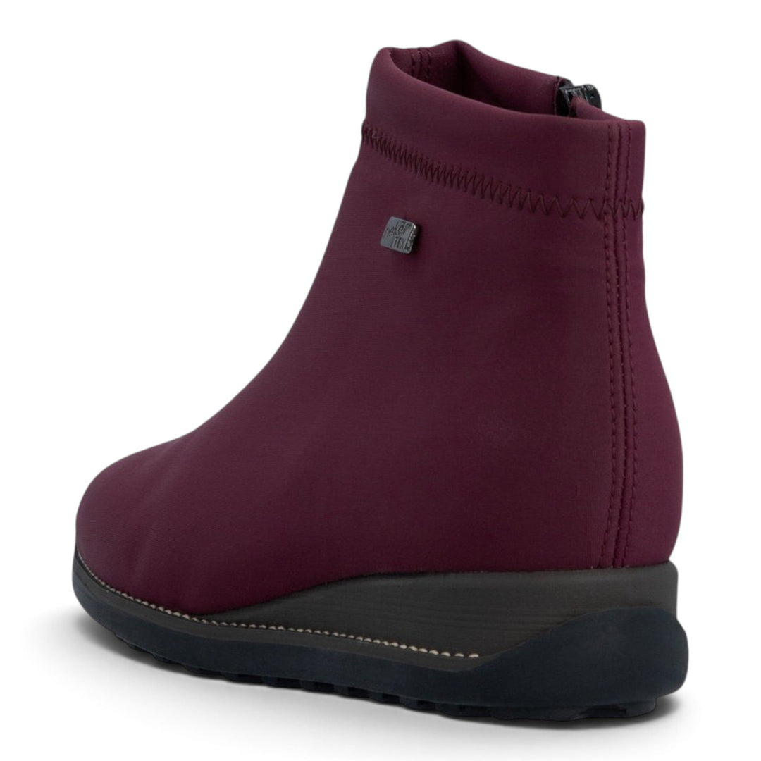 ada-shoes.ro Rieker burgundy stretch textile ankle boots with warm lining, side zipper, and flexible wedge sole