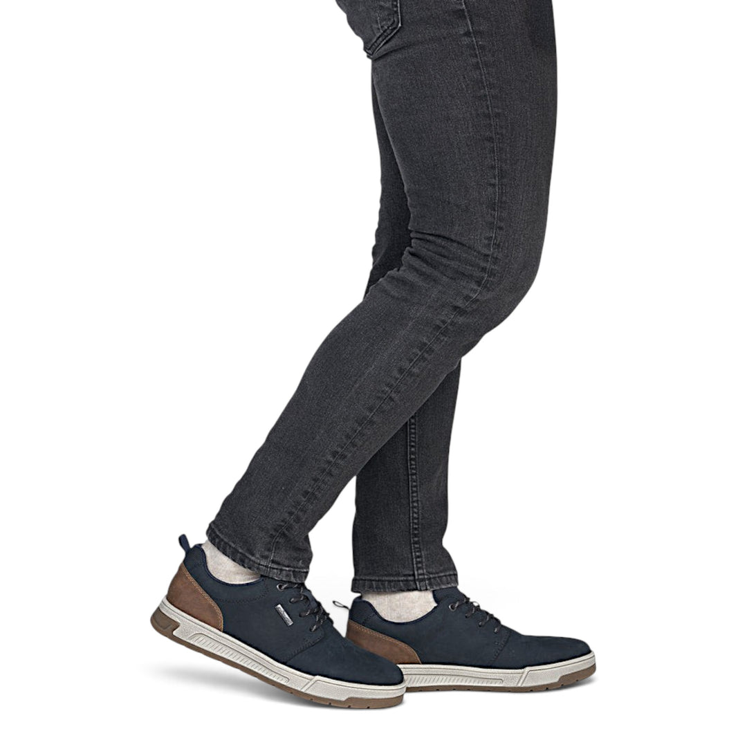 ada-shoes.ro Rieker navy blue nubuck casual shoes with brown heel detail and white sole worn with dark jeans