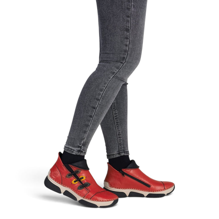 ada-shoes.ro Rieker red faux leather ankle boots with side zipper and felt lining worn with grey jeans