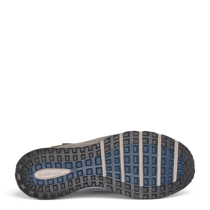 ada-shoes.ro Skechers Escape Plan trail shoe outsole with rugged blue and grey all-terrain traction pattern