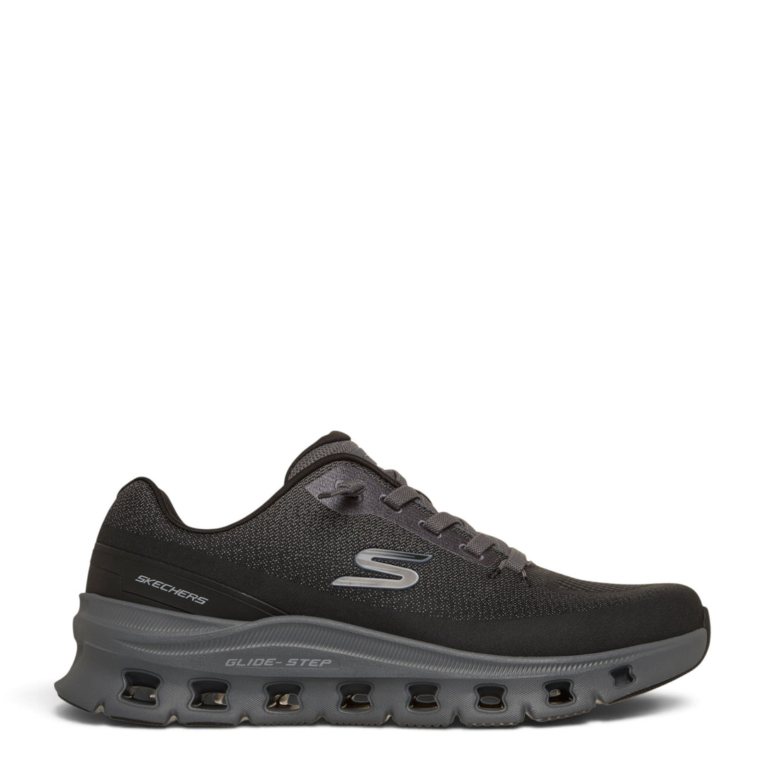 ada-shoes.ro Skechers Glide-Step Pro Waver black mesh sneakers with cushioned midsole and elastic no-tie laces.