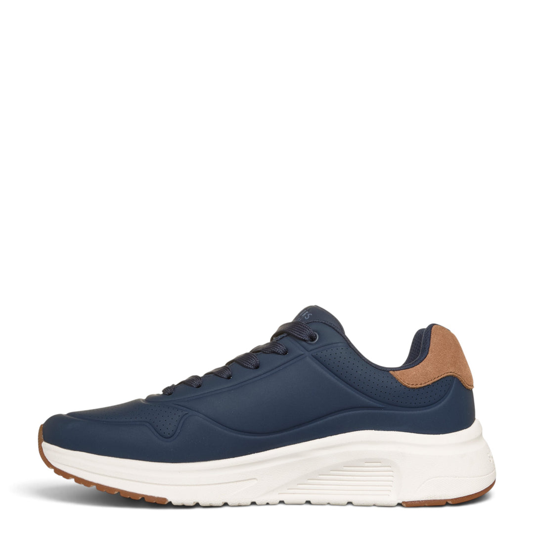 ada-shoes.ro Skechers Uno Lite navy blue sneakers with brown heel detail, white cushioned sole, and lace-up closure.