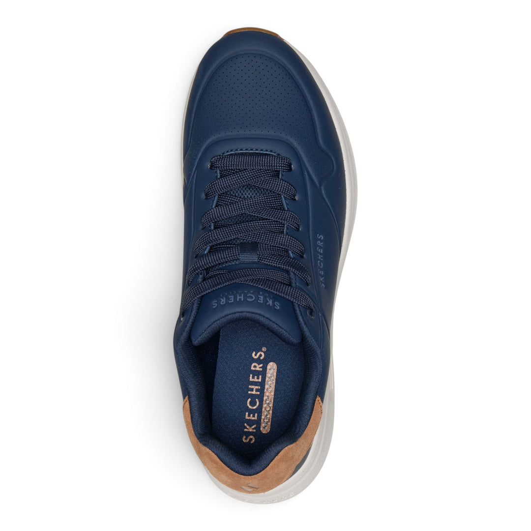ada-shoes.ro Skechers Uno Lite navy blue sneakers with brown heel detail, white sole, and perforated toe box.