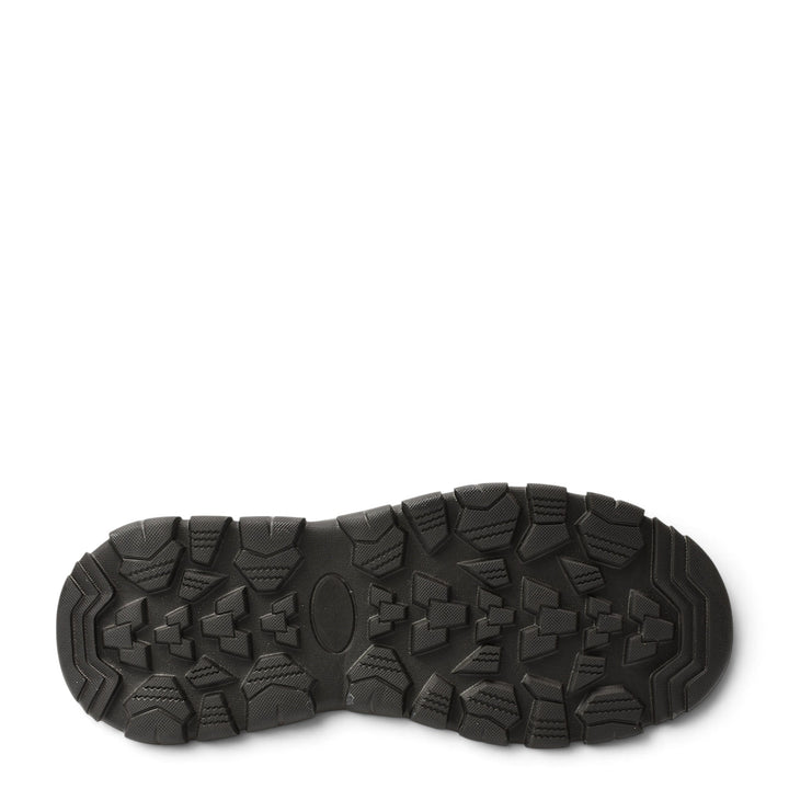 Black rubber sneaker sole with deep tread pattern for traction, from ada-shoes.ro