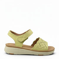 Ada Shoes yellow leather casual sandals with adjustable velcro strap and decorative cut-out detail on the front strap.