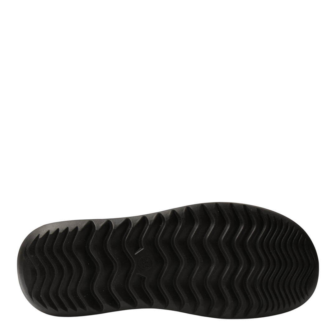 ada-shoes.ro Feeling MBH-4-N black boot sole with a thick, flexible, and anti-slip wavy tread pattern.