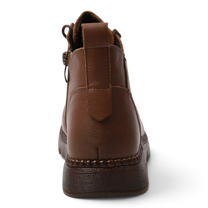 Back view of brown leather casual ankle boots by ada-shoes.ro with a side zipper and flexible textured sole