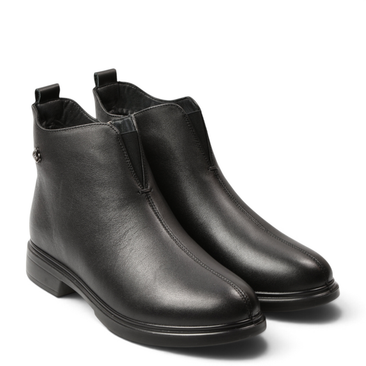 ada-shoes.ro Pass Collection black leather ankle boots with a minimalist design, central seam, and side zipper.