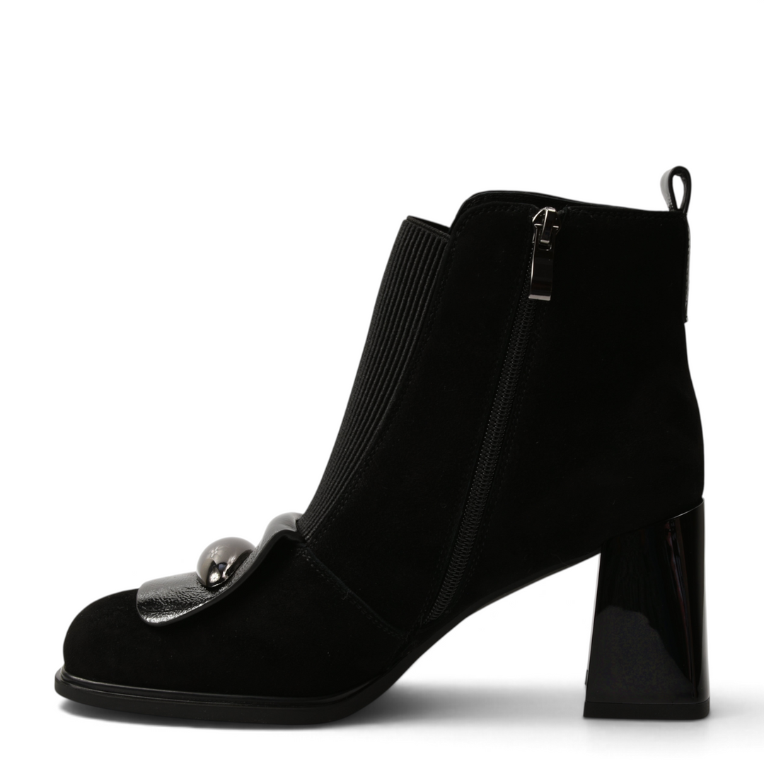 ada-shoes.ro black suede ankle boots with a chunky block heel, side zipper, and a decorative metallic front accent.