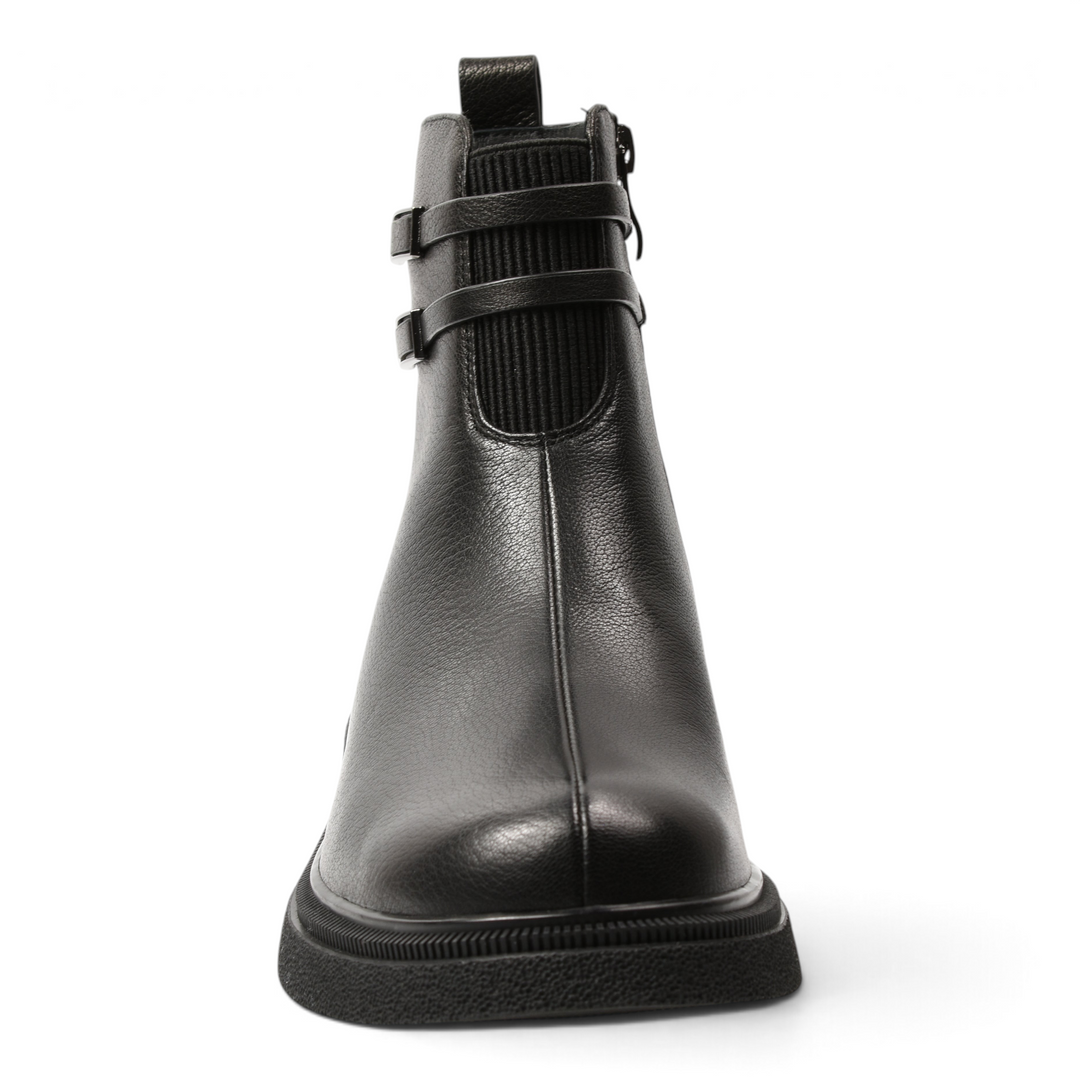 ada-shoes.ro black leather ankle boots with decorative straps and a low, flexible sole for a chic, minimalist look.