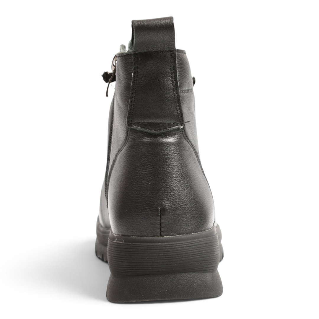 Back view of black leather Ada Shoes 5851-N casual boots with a durable outdoor sole and pull tab.