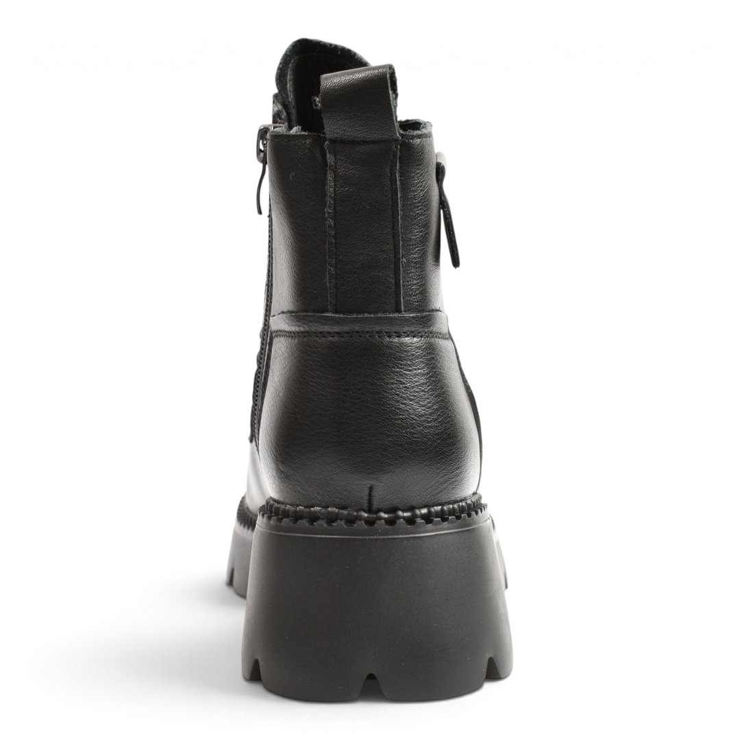 Back view of black leather casual boots by ada-shoes.ro with a thick outdoor sole and rear pull tab
