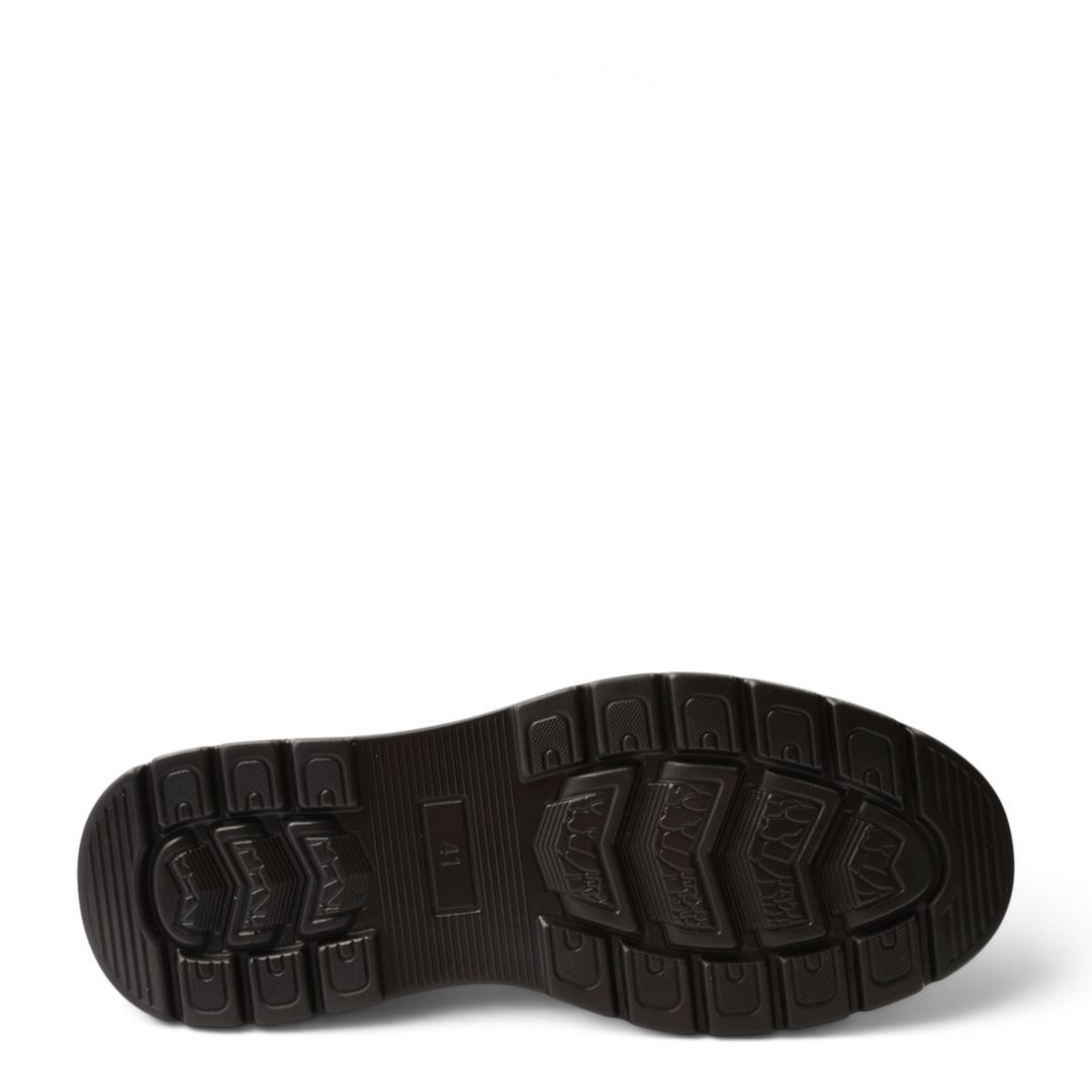 Black rubber sole of an ada-shoes.ro boot with a deep tread pattern for traction and size 41 marking