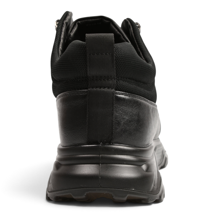 Rear view of black leather Ada Shoes M35610-N high-top sneakers with a padded collar and thick trekking-style sole.