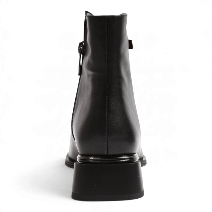 ada-shoes.ro black leather ankle boots with a geometric block heel, shown from the back view.