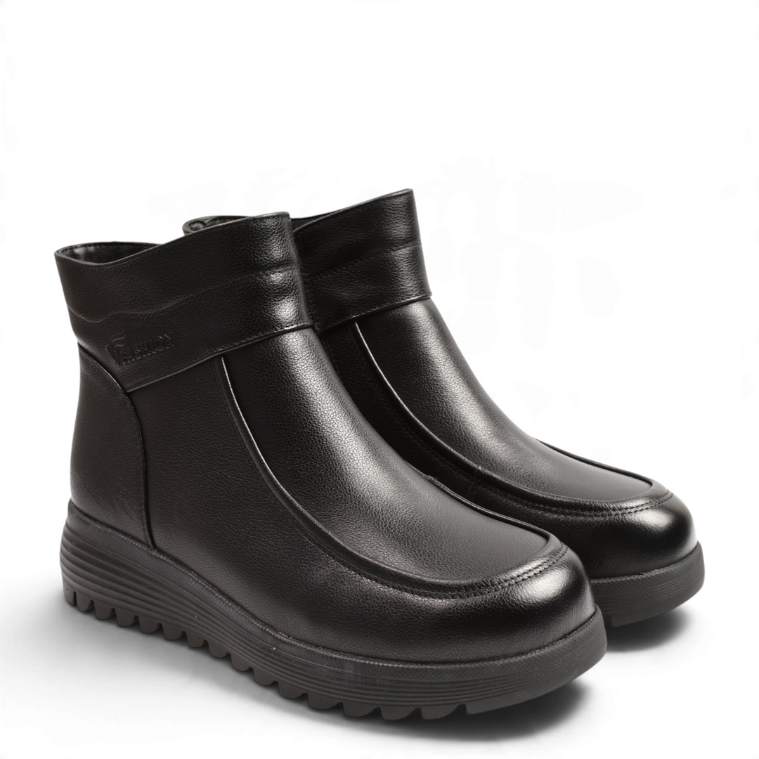 ada-shoes.ro Anna Viotti black leather ankle boots with moccasin-style stitching and thick lug sole for winter