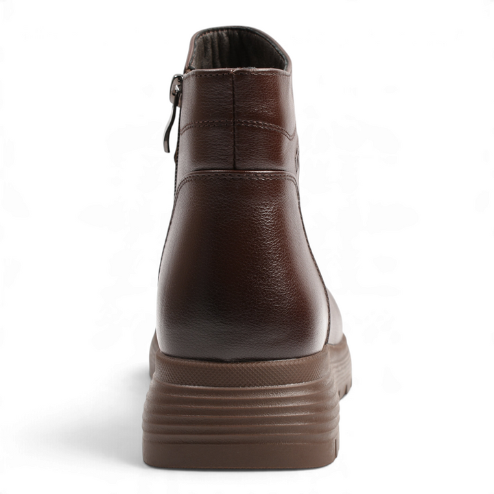 Back view of Anna Viotti brown leather ankle boots with a thick textured sole from ada-shoes.ro