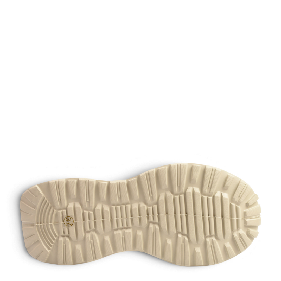 Beige chunky rubber outsole of Gryxx women&