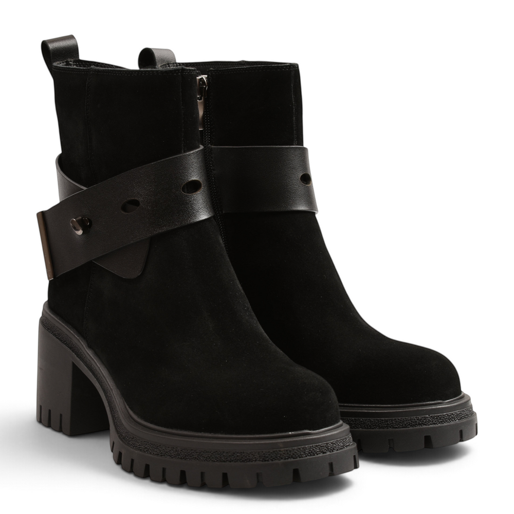 ada-shoes.ro black suede ankle boots with a decorative smooth leather strap, block heel, and lug sole.