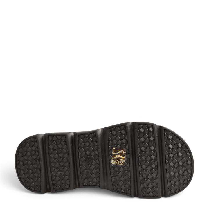 Black rubber sole of ada-shoes.ro boots with a textured, non-slip tread pattern for optimal grip.