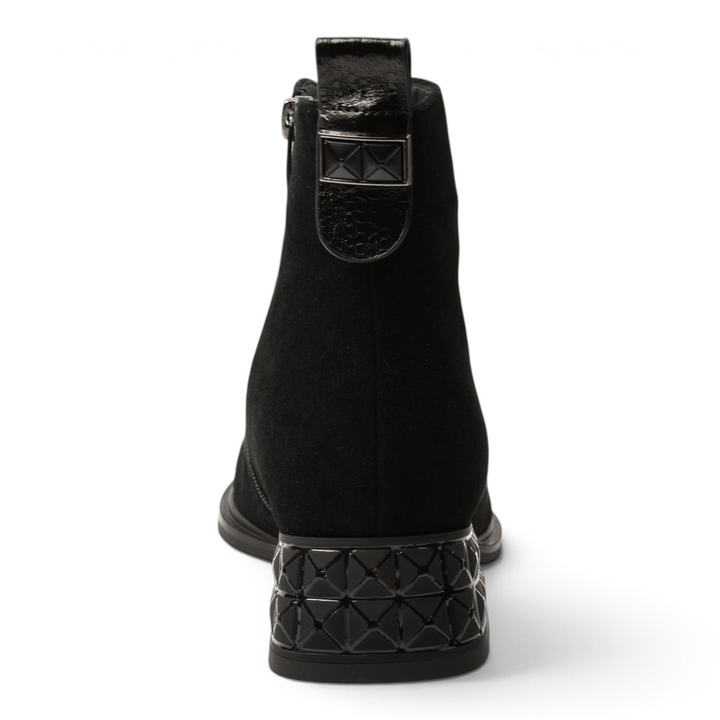 ada-shoes.ro black suede ankle boots with a geometric 3D textured heel and decorative back tab, rear view.
