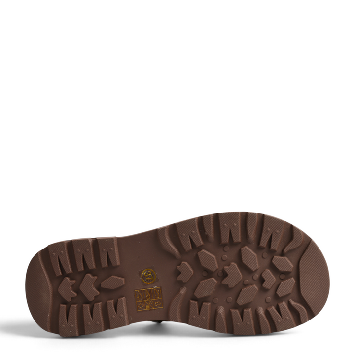 Brown lug sole of Ada Shoes 68001-K boots with deep tread pattern for traction and stability