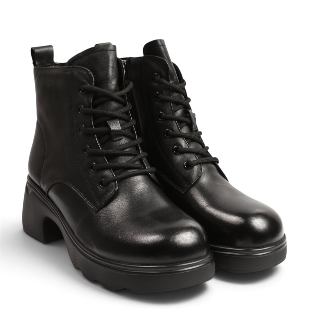 ada-shoes.ro black leather combat boots with lace-up front, side zipper, and chunky platform sole.