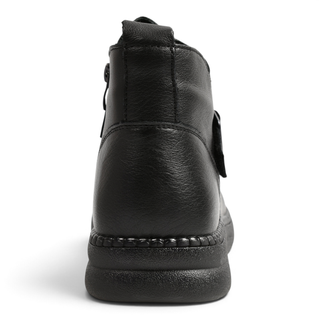 Back view of black leather Ada Shoes 97305-N ankle boots with a thick, textured sole and rear pull tab