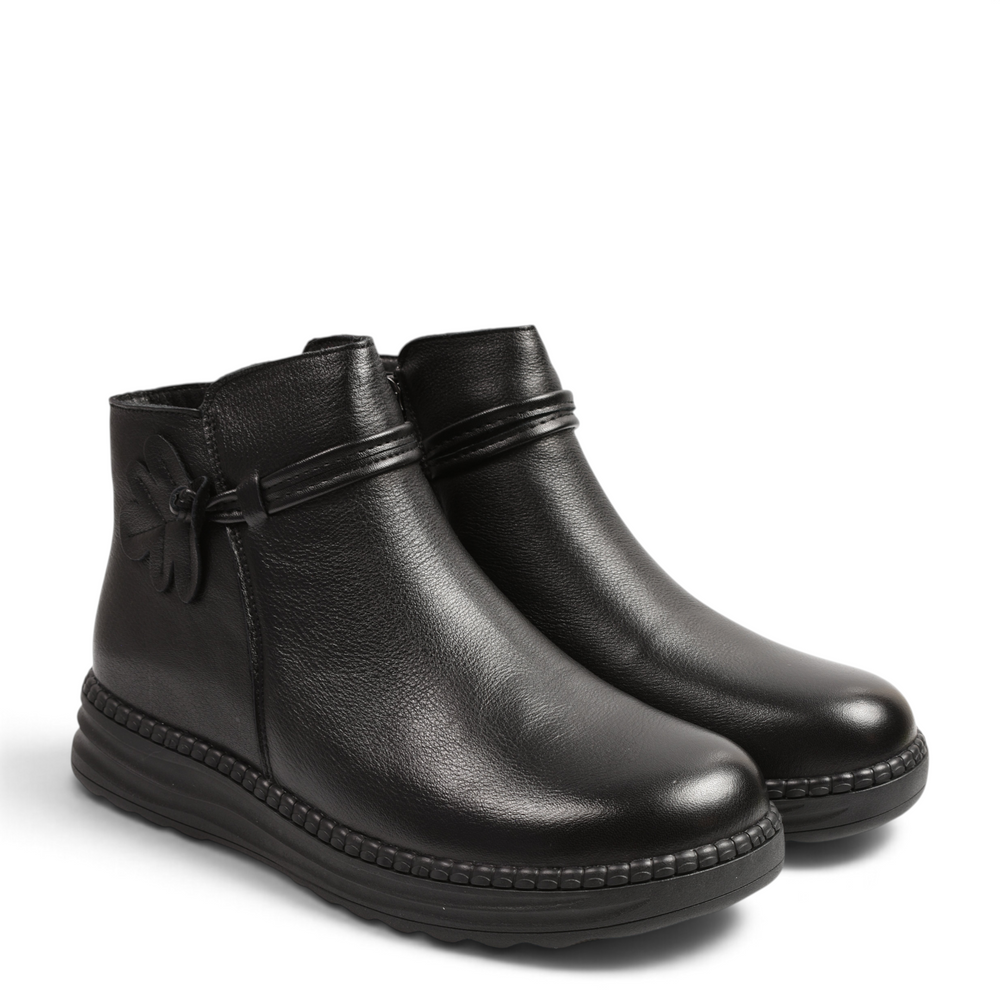 ada-shoes.ro black leather ankle boots with a decorative floral strap and flexible low sole for women