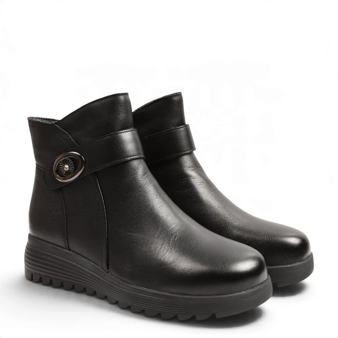 ada-shoes.ro Anna Viotti black leather ankle boots with decorative buckle and thick lug sole for winter comfort
