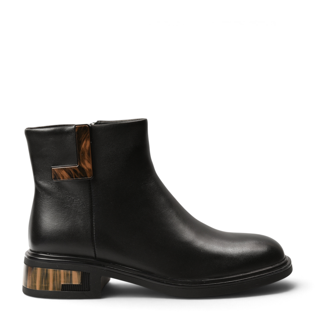 ada-shoes.ro black leather ankle boots with a rounded toe, side zipper, and a unique geometric wood-effect heel detail.