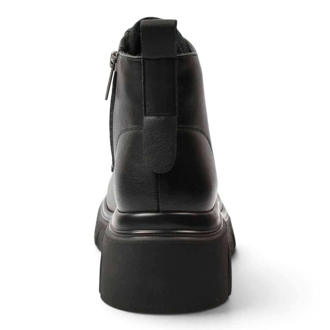 Back view of black leather Pass Collection combat boots with a thick track sole and pull-tab from ada-shoes.ro