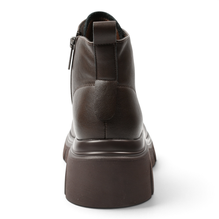 Back view of brown leather Pass Collection ankle boots featuring a chunky platform sole and side zipper detail.