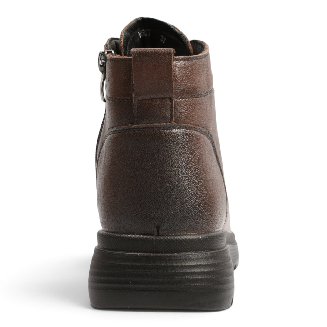 Back view of brown leather Ada Shoes M8607-M ankle boots with a thick, textured black sole and rear pull tab.