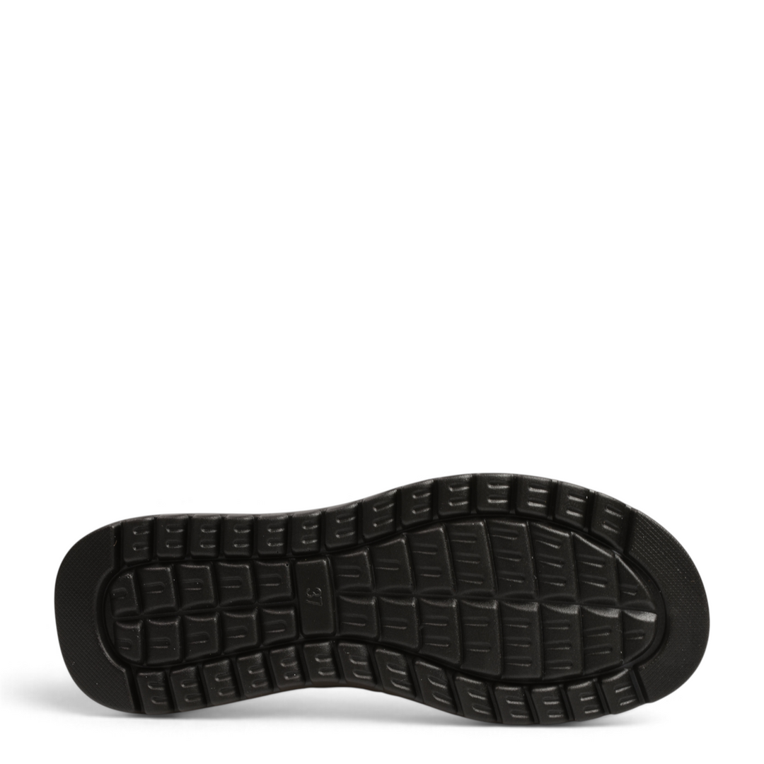 Black non-slip rubber sole of ada-shoes.ro M8607-M boots with a textured grid pattern for traction