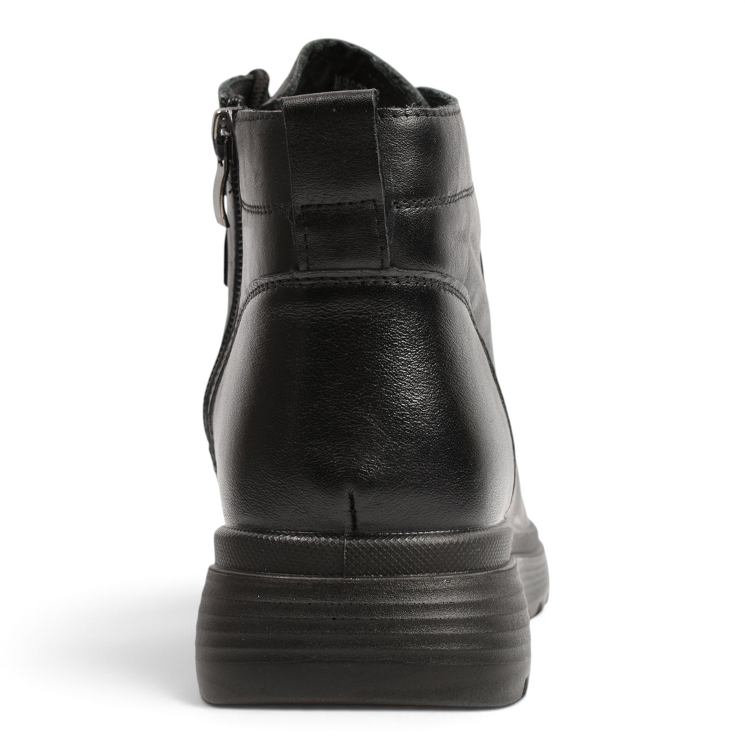 Back view of ada-shoes.ro black leather ankle boots with a thick, flexible sole and a convenient pull tab.