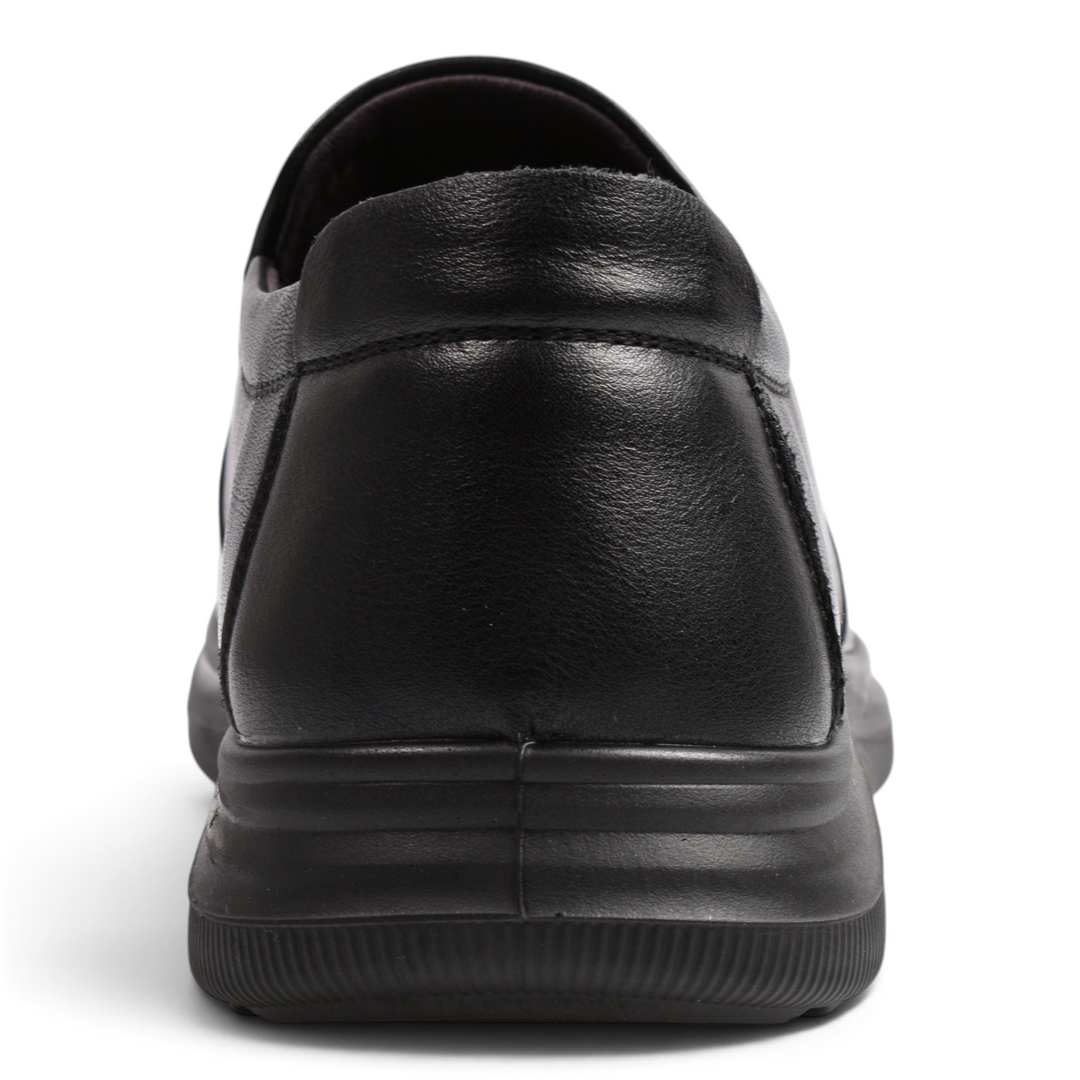 Back view of black leather slip-on casual shoes by ada-shoes.ro with a flexible sole and ergonomic design