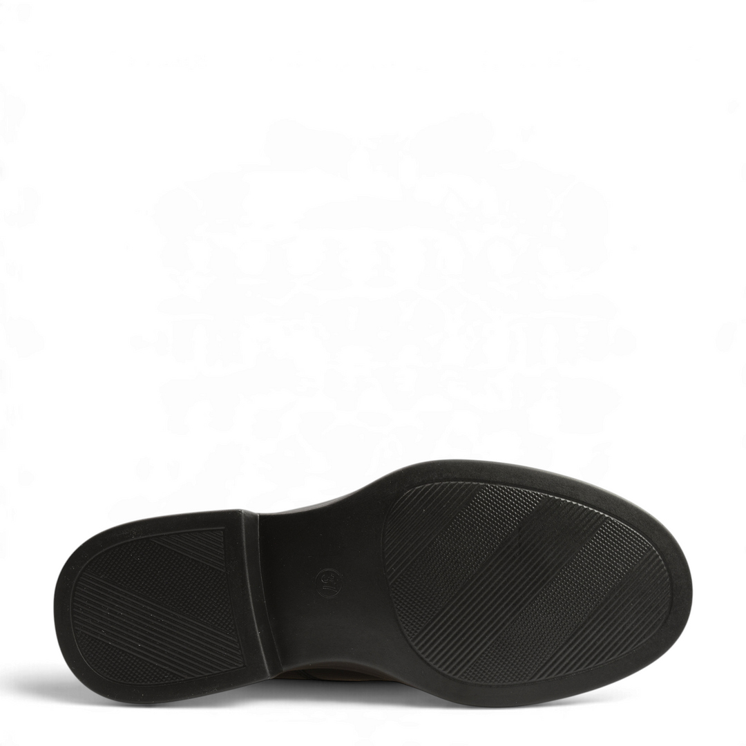 Black flexible rubber outsole of an Anna Viotti men&