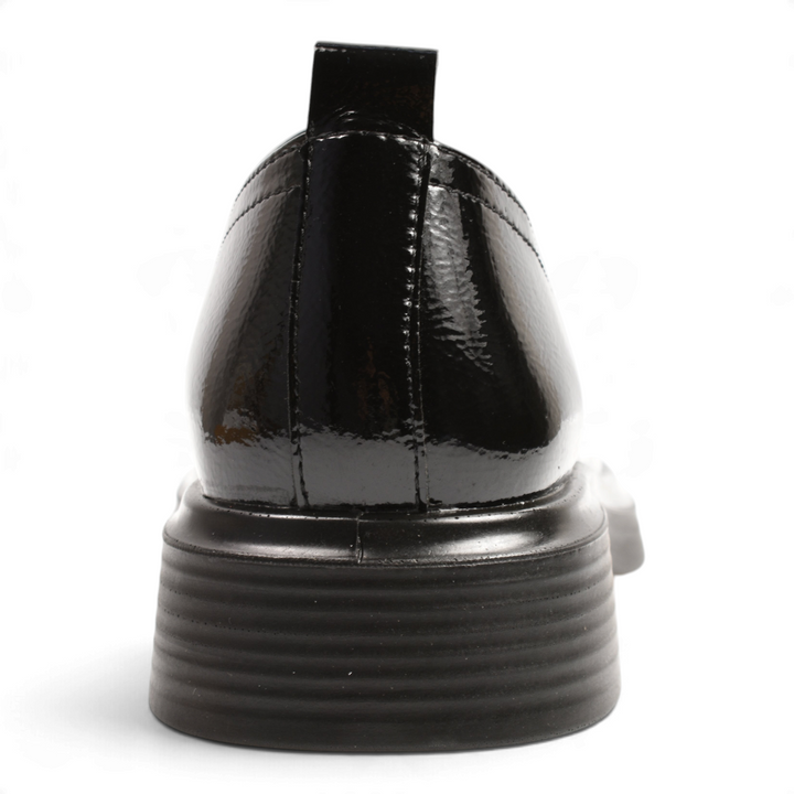 ada-shoes.ro Anna Viotti black patent leather loafers with a thick rubber sole and heel pull tab, back view.